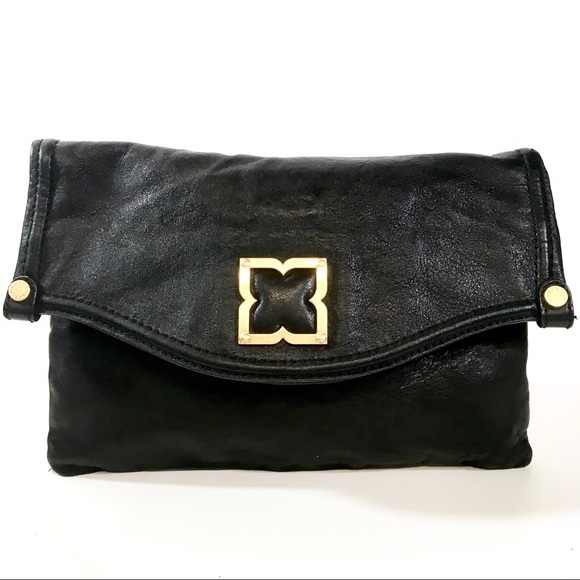 BCBGMaxAzria Handbags - BCBGMAXAZRIA Fold Over Black Leather Clutch